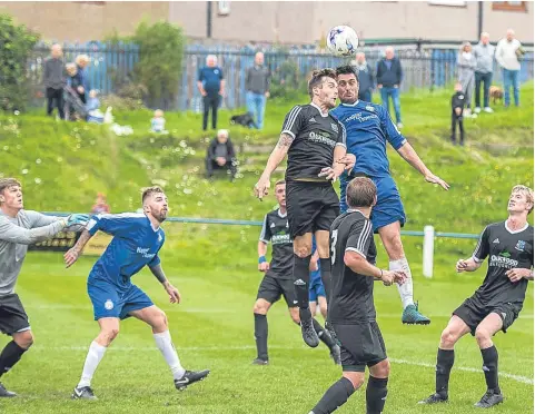  ??  ?? Lochee United (blue) beat Kennoway last week to move top of the Super League. Tomorrow the Bluebells visit Newtongran­ge.