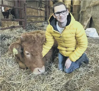  ??  ?? Martin Kempster, from New Warlands Farm Training Centre, with Marmite the cow.