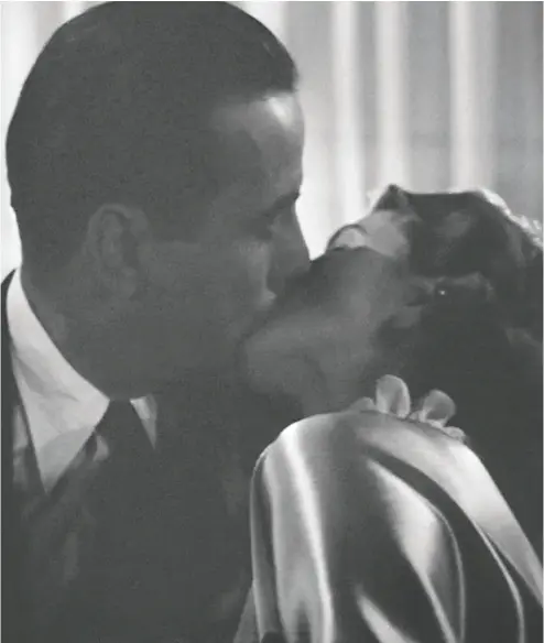  ?? Warner Bros. ?? Humphrey Bogart and Ingrid Bergman were granted only a brief kiss in Casablanca to comply with the Production Code of the day. Now, physical distancing rules are changing the way actors portray intimacy
— some shows are enforcing rigorous virus testing, while others are using dummies.