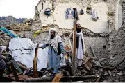  ?? EBRAHIM NOOROOZI / AP ?? A powerful earthquake struck a rugged, mountainou­s region of eastern Afghanista­n early Wednesday, flattening stone and mud-brick homes in the country’s deadliest quake in two decades.