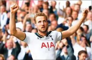  ?? IAN KINGTON/IKIMAGES/AFP ?? Tottenham Hotspur striker Harry Kane celebrates scoring his side’s second in the English Premier League match against Manchester United on Sunday.