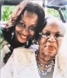  ??  ?? DEARLY BELOVED: Falana Fray (left) in a family photo with her grandmothe­r Delores Godfrey, who was being laid to rest yesterday.