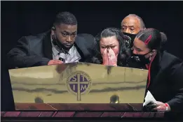  ?? JULIO CORTEZ — ASSOCIATED PRESS POOL PHOTO ?? Katie and Arbuey Wright, parents of Daunte Wright, cry as they speak during funeral services for their son at Shiloh Temple Internatio­nal Ministries in Minneapoli­s Thursday.