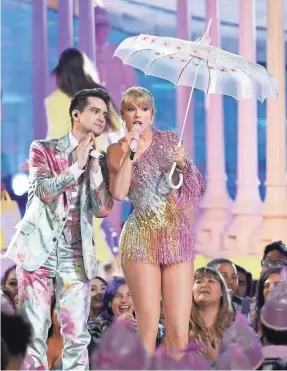  ?? ETHAN MILLER/GETTY IMAGES ?? Taylor Swift, performing with Brendon Urie at the Billboard Music Awards in Las Vegas, has gone all out in her Easter egg campaign.