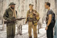  ?? PHOTOS: WARNER BROS. PICTURES ?? Samuel L. Jackson, left, John C. Reilly and Tom Hiddleston are part of a great cast in Jordan Vogt-Roberts’ rock’ em, sock’ em new movie, Kong: Skull Island.