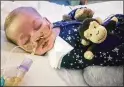  ?? FAMILY OF CHARLIE GARD/ AP ?? Charlie Gard rests at Great Ormond Street Hospital in London. His parents had tried to get an experiment­al treatment for him.