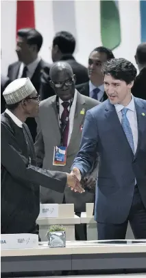  ?? GETTY IMAGES ?? Nigeria’s president, Muhammadu Buhari, greets Prime Minister Justin Trudeau at a summit last year. Canada exports wheat to Nigeria, but there are bigger opportunit­ies in Africa’s emerging tech industry.