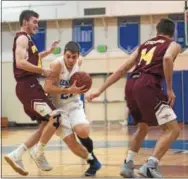  ?? MICHAEL REEVES — FOR DIGITAL FIRST MEDIA ?? Jack Mullen of Kennett drives to the basket against Avon Grove on Saturday.