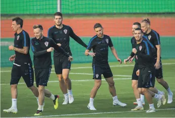  ?? EPA ?? Croatia have been taken to extra time in their past three matches, but the players looked relaxed during training on the eve of the World Cup final against France