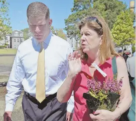  ?? STAFF PHOTOS BY PATRICK WHITTEMORE ?? SPEAKING UP: Joanne McDevitt, top at left with Dr. Robert Morris and above, approached Mayor Martin J. Walsh with concerns.