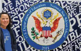  ?? CONTRIBUTE­D ?? Stacy Cline, art teacher at Orchard Park Elementary School in Kettering, spearheade­d the community project to create a Lego mosaic to commemorat­e the school’s National Blue Ribbon Schools award.