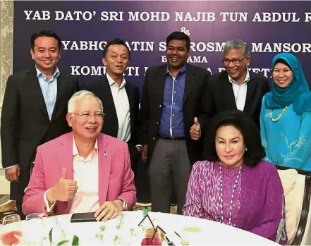  ??  ?? Raring to go: Jayasiri (standing second from right) and his team of negotiator­s taking a break at a dinner, hosted by the Malaysian embassy at the end of Apec Summit in Vietnam, with Najib and Datin Seri Rosmah Mansor.