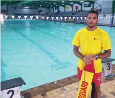  ??  ?? Lifeguard Cameron Vannithing has been hailed for resuscitat­ing an unconsciou­s man after rescuing him from drowning at Strand beach.