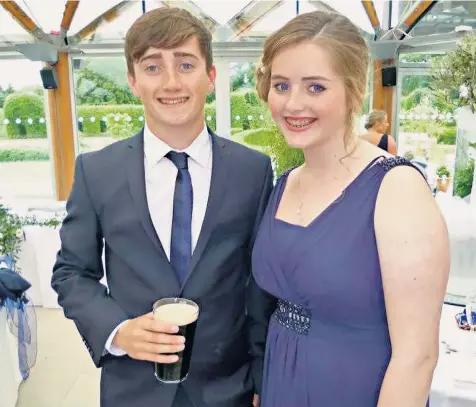  ??  ?? Declan Millane shared photograph­s of himself with his sister Grace, above, as police set up roadblocks, above left, near where her body was found