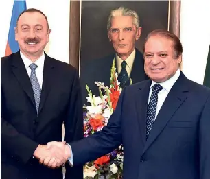  ?? APP ?? Prime Minister Nawaz Sharif shaking hands with Azerbaijan President Ilham Aliyev at the PM House in Islamabad on Tuesday. —