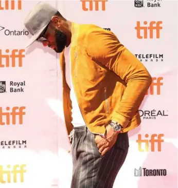  ?? STEVE RUSSELL PHOTOS/TORONTO STAR ?? Thousands gathered for the premiere of The Carter Effect on Saturday to spot stars such as LeBron James.