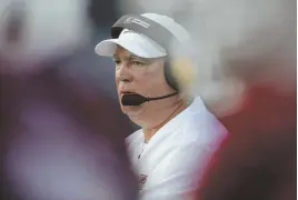  ?? AP PHOTO ?? A STEP BEHIND: UMass coach Mark Whipple and his Minutemen fell to Georgia Southern, 34-13, on Saturday in Statesboro, Ga.