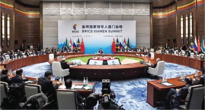  ??  ?? XIAMEN: A plenary session of the BRICS Summit is held in Xiamen, Fujian province, China yesterday. Five major emerging economies opened a summit yesterday to map out their future course, with host Chinese President Xi Jinping calling on them to play a...
