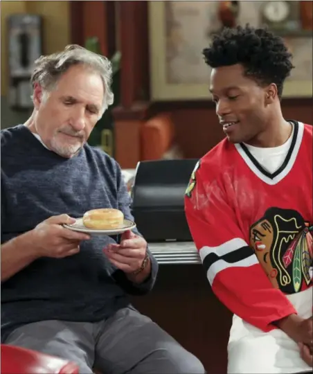  ?? MICHAEL YARISH — CBS VIA AP ?? This image released by CBS shows Judd Hirsch, left, and Jermaine Fowler in a scene from the new comedy series, “Superior Donuts,” beginning its second season today.