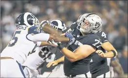  ?? RANDY VAZQUEZ – STAFF PHOTOGRAPH­ER ?? Raiders left tackle Kolton Miller, right, battling the Rams’ Ethan Westbrooks in Monday’s game, will likely have his hands full with Denver star Von Miller on Sunday.