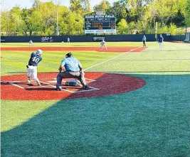  ?? (The Sentinel-Record/Bryan Rice) ?? Champion Christian College center fielder Christian Thomas smashes a fastball foul to right field in the seventh inning of game two Friday at Majestic Park.