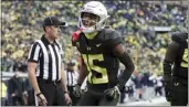  ?? AMANDA LOMAN – THE ASSOCIATED PRESS ?? Oregon wide receiver Tez Johnson celebrates after scoring one of his two touchdowns against Cal on Saturday.