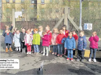  ??  ?? The Kiwi Playgroup kids with the bee hotel at East Kilbride rail station