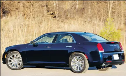  ?? — PHOTOS: DAVID BOOTH/DRIVING ?? The 2015 Chrysler 300C Platinum looks like a car Al Capone would drive.