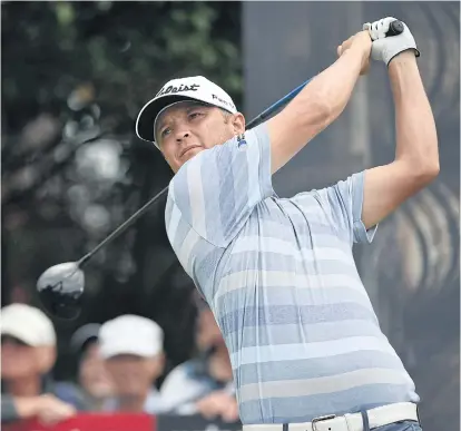  ??  ?? Matthew Jones tees off on the seventh hole at the Australian Golf Club in Sydney.