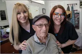  ?? KARL MONDON — STAFF PHOTOGRAPH­ER ?? Retired barber Gabe Gonzales, 96, visits Bellarmine Barber Shop on Thursday, where the San Jose business he opened 70years ago is now safely in the hands of his daughter Esther Faria, left, and granddaugh­ter, Stacey Gonzales, Faria's niece.