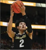  ?? (AP/John Amis) ?? Colorado guard KJ Simpson scored 23 points and grabbed 10 rebounds to lead Colorado past No. 11 Tennessee 78-66 on Sunday afternoon in Nashville, Tenn.