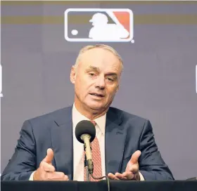  ?? LM OTERO/AP ?? MLB Commission­er Rob Manfred speaks during a news conference Thursday after owners locked out players following the expiration of the sport’s CBA.