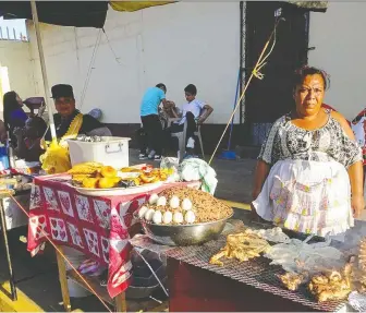  ?? PHOTOS: YVONNE KONAR ?? A vendor prepares dishes for Good Friday in Leon, Nicaragua.