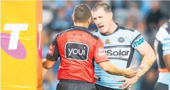  ?? Photo / Getty ?? Sharks captain Paul Gallen argues with referee Ashley Klein at the end of Sunday’s clash against the Cowboys.