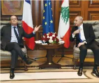  ?? (Ali Fawaz/Lebanese Parliament website/Reuters) ?? FRENCH PRESIDENT François Hollande meets with Lebanese Parliament Speaker Nabih Berri in Beirut yesterday.