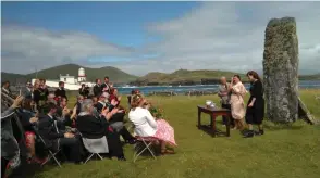  ??  ?? LEFT: Guests at the lighthouse for the wedding of Anna Griffiths and Orla O’Carroll.
BELOW: Anna and Orla.