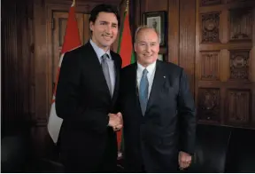  ?? CP FILE PHOTO ?? Prime Minister Justin Trudeau meets with the Aga Khan on Parliament Hill in Ottawa on May 17, 2016. Federal ethics commission­er Mary Dawson has concluded that Trudeau violated conflict of interest rules when he vacationed last Christmas at the private...