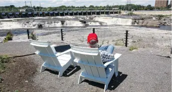  ?? WAYNE CUDDINGTON ?? The dam at Chaudiere Falls, where the Ottawa River plunges over a series of limestone ledges, now boasts a public viewing area on the west end of Albert island.