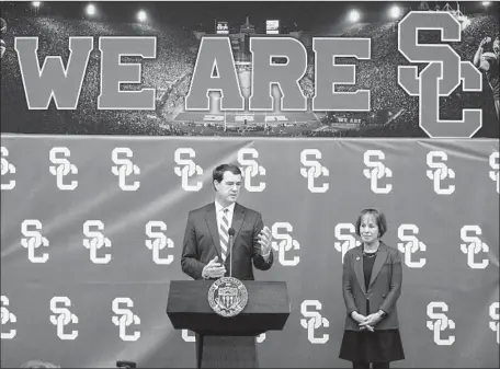  ?? Brian van der Brug Los Angeles Times ?? MIKE BOHN, introduced by USC President Carol L. Folt as the new athletic director this month, said “good programs finish strong.”