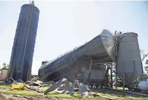  ?? JOE WARNER/NJ ADVANCE MEDIA VIA AP ?? Damage to Wellacrest Farms is shown after a tornado spawned by the remnants of Hurricane Ida passed through the area in Mullica Hill, N.J., on Thursday.