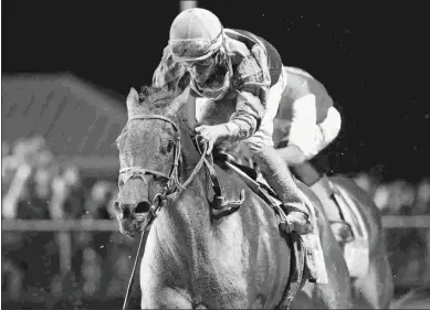  ?? COADY PHOTOGRAPH­Y ?? Tequilita and jockey Luis Saez win the Grade 3 Charles Town Oaks by 1 1/4 lengths on Sept. 23.