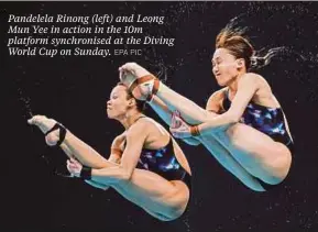  ?? EPA PIC ?? Pandelela Rinong (left) and Leong Mun Yee in action in the 10m platform synchronis­ed at the Diving World Cup on Sunday.