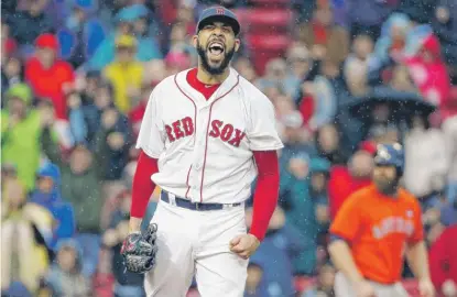  ?? | AP ?? David Price revels in the moment after striking out the Astros’ George Springer with the bases loaded in the seventh inning.