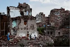  ?? ?? A home destroyed by an airstrike in the old city of Sana, Yemen, on Oct. 23, 2018. The Houthi militia in Yemen has propelled itself into the global spotlight in recent weeks as it has sown chaos in the Red Sea, attacking commercial ships and hobbling global trade.