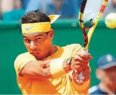  ?? AP ?? Nadal returns to Gregor Dimitrov at the semi-final match of the Monte Carlo Tennis Masters tournament yesterday.