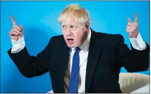  ?? AP/DANNY LAWSON ?? “Too often there are parts of our country, parts of London still and other cities as well, where English is not spoken by some people as their first language. And that needs to be changed,” Boris Johnson said at a Conservati­ve Party gathering in Nottingham, England.