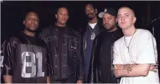  ?? KEVIN MAZUR ?? Eminem, right, with Ice Cube, Snoop Dogg, Dr. Dre and MC Ren. The rapper’s 1999 debut The Slim Shady LP became a runaway success with the backing of Aftermath and Interscope.