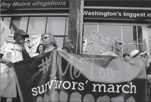  ?? The Associated Press ?? SURVIVOR’S MARCH: Participan­ts rally outside CNN’s Hollywood studios on Sunset Boulevard on Nov. 12 to take a stand against sexual assault and harassment for the #MeToo March in the Hollywood district of Los Angeles. A spate of recent public...