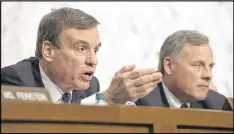  ?? SUSAN WALSH / AP ?? Senate Intelligen­ce Committee Vice Chairman Sen. Mark Warner, D-Va., (left) sitting next to Chairman Sen. Richard Burr, R-N.C., are the top Democrat and Republican on the panel.