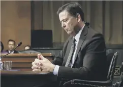  ??  ?? 0 FBI director James Comey was sacked by Donald Trump